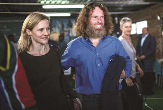 McGown leaves with his wife Catherine after the news conference at the Gift of the Givers foundation headquarters in Johannesburg.
