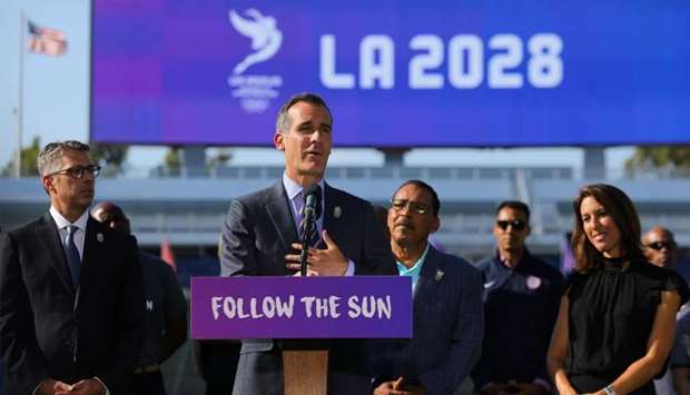 Los Angeles Mayor Garcetti speaks at the podium announcing that the city of Los Angeles will host the 2028 Olympic Games