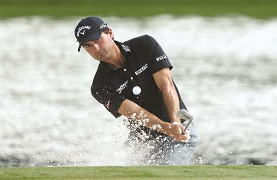 Kevin Kisner of the United States plays his shot out of the bunker on the 17th hole during the second round of the 2017 PGA Championship at Quail Hollow Club in Charlotte, North Carolina, yesterday. (AFP)