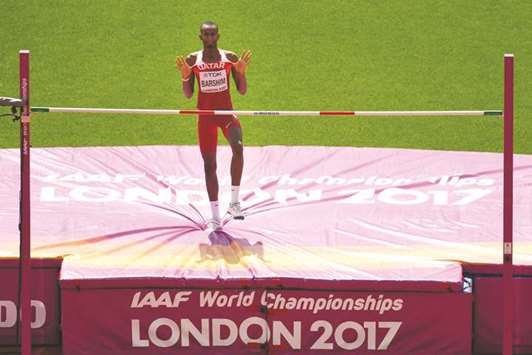 Qataru2019s Mutaz Essa Barshim celebrates after clearing the automatic qualifying height of 2.31m during the menu2019s high jump qualification round at the 2017 IAAF World Championships in London yesterday. (AFP)