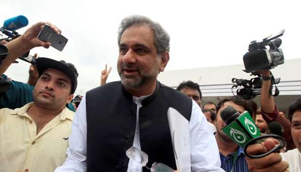 Pakistan's former Petroleum Minister and Prime Minister designate Shahid Khaqan Abbasi arrives to attend the National Assembly session in Islamabad.
