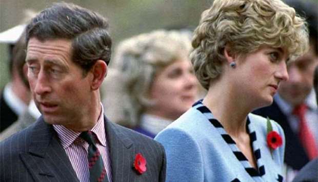 Princess Diana and Prince Charles look in different directions in this November 1992 file picture.