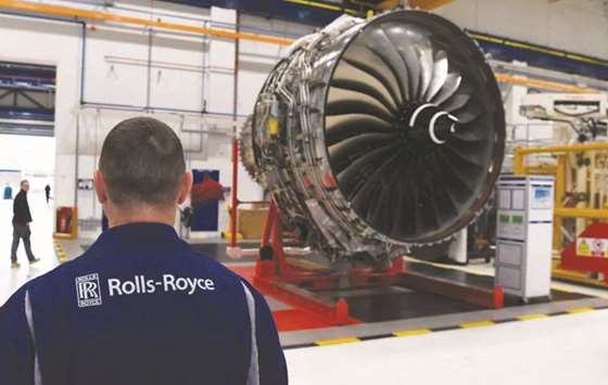Rolls Royce Trent XWB engines, designed specifically for the Airbus A350 family of aircraft, are seen on the assembly line at the Rolls Royce factory in Derby. Rolls topped the FTSE yesterday with a gain of 10.3% to 979 pence.