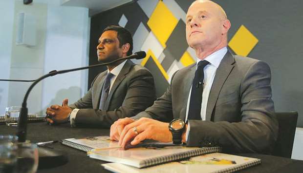Commonwealth Bank (CBA) CEO Ian Narev (right) and CFO Rob Jesudason prepare to address a news conference announcing the banku2019s full year results in Sydney (file). About A$6.6bn has been wiped off CBAu2019s market capitalisation since last Thursday, sources said.