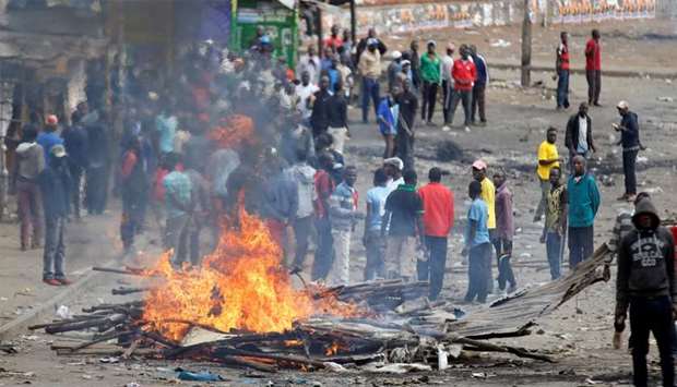 Protesters set barricade on fire in Mathare, in Nairobi