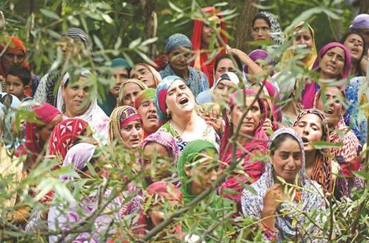 Relatives of a Kashmiri civilian mourn during his funeral at Begum Bagh Pulwama, south of Srinagar, yesterday. He died during protests against the killing of a top militant commander.