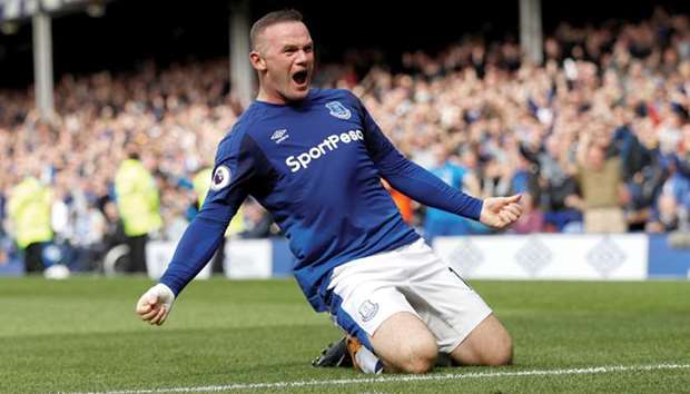 Evertonu2019s Wayne Rooney celebrates scoring yesterday.