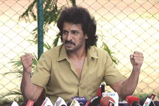 Kannada actor Upendra gestures during a press conference in Bengaluru yesterday.