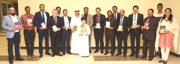 Qatar News Agency chief editor Khaled al-Zeyana with LuLu Group officials and others after opening the book fair.