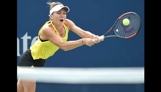 Simona Halep of Romania plays a shot against Caroline Garcia of France (not pictured) during the Rogers Cup tennis tournament at Aviva Centre. Picture: Dan Hamilton-USA TODAY Sports