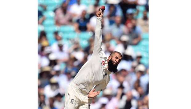 Englandu2019s Moeen Ali bowls on the fifth and final day of the third Test match between England and South Africa at The Oval cricket ground in London on Monday.