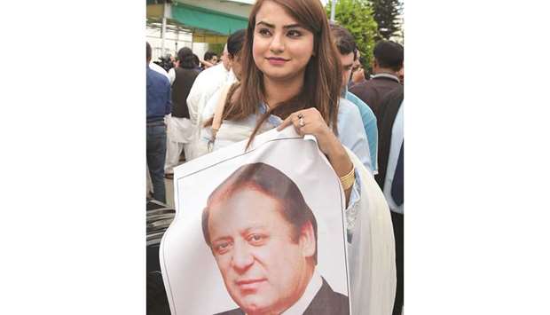 A Pakistani parliamentarian from the ruling PML-N party Maiza Hameed outside the parliament.