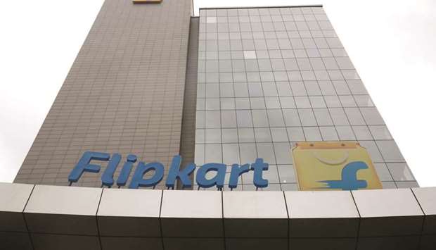 The logo of Indiau2019s largest e-commerce firm Flipkart is seen on the facade of the companyu2019s headquarters in Bengaluru. SoftBanku2019s plan to invest $2.5bn in the Indian e-commerce player will swell Flipkartu2019s cash holdings to more than $4bn.