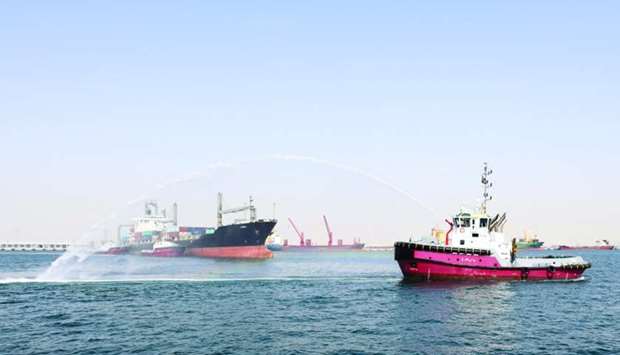 The first weekly direct container vessel service from Karachi Port being received with a water salute at Hamad Port