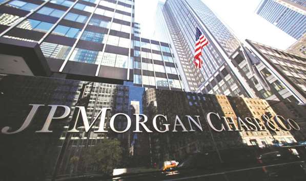 A sign is seen outside the headquarters of JP Morgan Chase & Co in New York. Ukrainian GDP warrants, tied to economic growth that negotiated a $15bn debt overhaul less than two years ago, have surged more than 50% since JPMorgan recommended them to investors in late March.