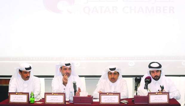 Officials from the Ministry of Administrative Development, Labour and Social Affairs, and Qatar Chamber during a seminar on the new electronic system for work permits. PICTURE: Shemeer Rasheed