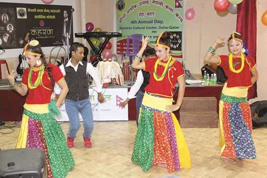 Members of the Nepalese Cutural Center perform a traditional dance during a programme.