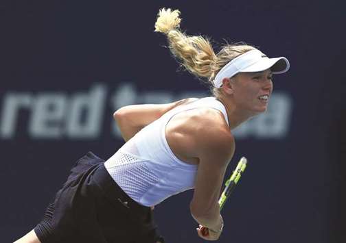 Caroline Wozniacki of Denmark serves against Sloane Stephens of the United States during a semi-final match on Day 8 of the Rogers Cup at Aviva Centre in Toronto.