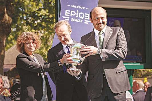Al Shaqab Racingu2019s executive director Khalifa bin Mohamed al-Attiyah receives the trophy after Al Wukair won Prix du Haras de Fresnay-le-Buffard u2013 Jacques Le Marois in Deauville, France, yesterday. PICTURE: Zuzanna Lupa