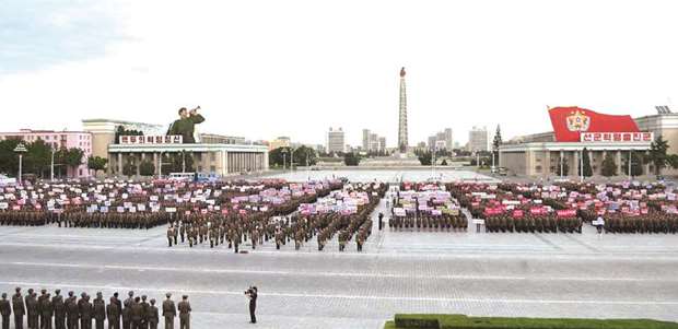 North Korean working youth and university students marching to demand to join or rejoin the Korean Peopleu2019s Army after the UN Security Councilu2019s u201csanctions resolutionu201d.