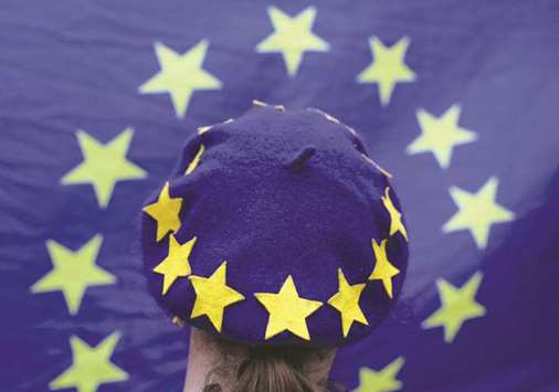 This picture taken on March 29 shows a protester wearing an EU flag-themed beret at an anti-Brexit demonstration in Birmingham.