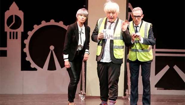 Member of the cast James Witt, as Boris Johnson, James Dangerfield, as Michael Gove, and Virge Gilchrist, as Theresa May, perform in 'Brexit-The Musical' at the Edinburgh Fringe, in Edinburgh.
