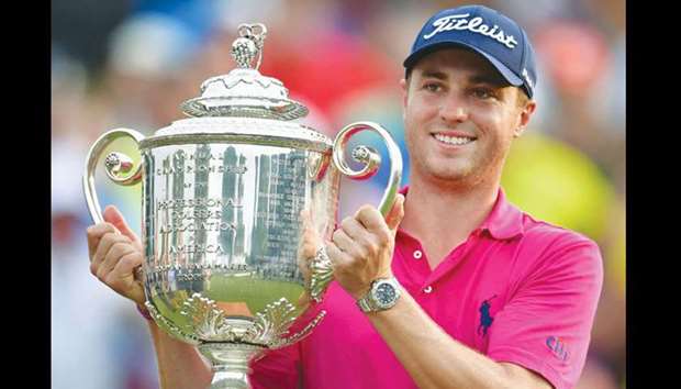 Justin Thomas of the United States poses with the Wanamaker Trophy after winning the 2017 PGA Championship during the final round at Quail Hollow Club in Charlotte, North Carolina.