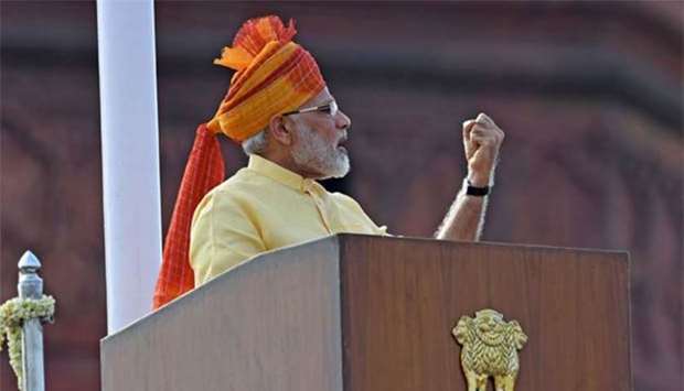 Prime Minister Narendra Modi delivers his address at the Red Fort in New Delhi on Tuesday.