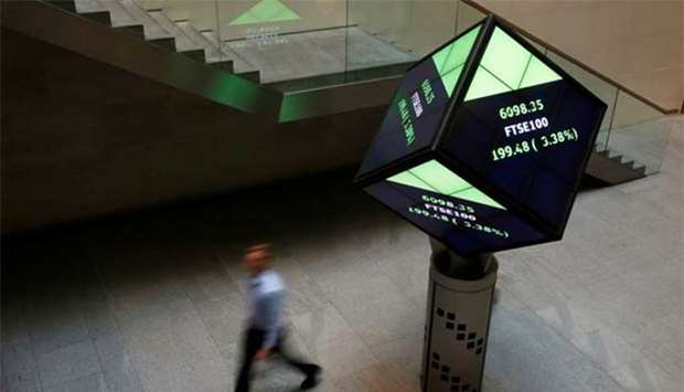 A man walks through the lobby of the London Stock Exchange. File picture