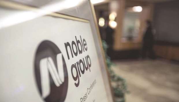 Noble Group signage is displayed during an investor day in Singapore. Moodyu2019s Investors Service has downgraded Nobleu2019s corporate family rating and senior unsecured bond ratings to Caa3 from Caa1.