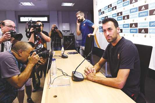 Barcelona midfielder Sergio Busquets attends a press conference yesterday. (AFP)