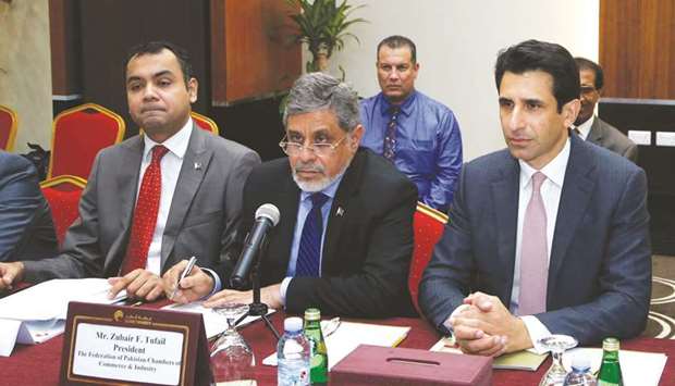 Tufail (centre) is flanked by Pakistan ambassador Shahzad Ahmad and other members of the Pakistani business delegation, who met with Qatar Chamber officials yesterday. PICTURE: Jayaram