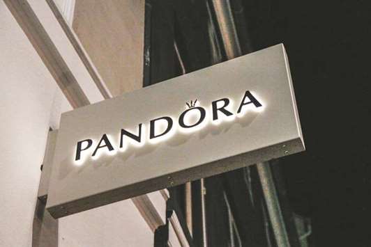 n illuminated logo is displayed outside a Pandora jewellery store in Copenhagen. Hedge funds betting against Pandora have continued to build their short positions after the Danish jewellery maker last week reported earnings that missed estimates.