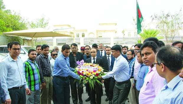 Bangladesh ambassador Ashud Ahmed along with embassy officials placing floral wreaths in front of the protrait of the Father of the Nation Bangabandhu Sheikh Mujibur Rahman