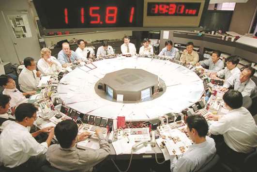 An electronic price board flashing the US dollar/yen exchange rate at a foreign  exchange market in Tokyo. Japanu2019s debt load is now more than 200% of its gross domestic product.