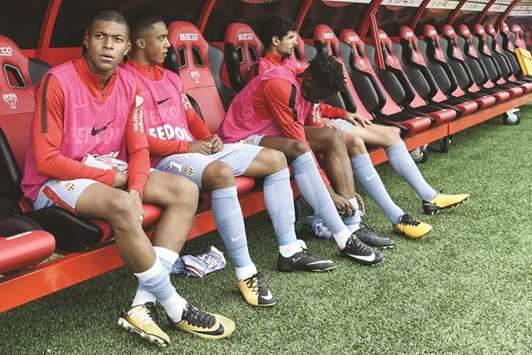 Kylian Mbappe (left) started Monacou2019s first two competitive matches of the season but sat on the bench for the duration of the principality clubu2019s 4-1 Ligue 1 victory at Dijon on Sunday. (AFP)