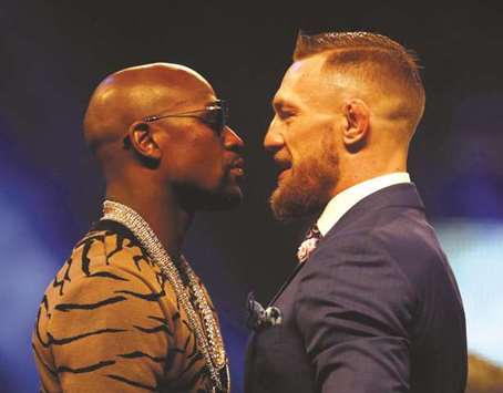Floyd Mayweather (left) and Conor McGregor.