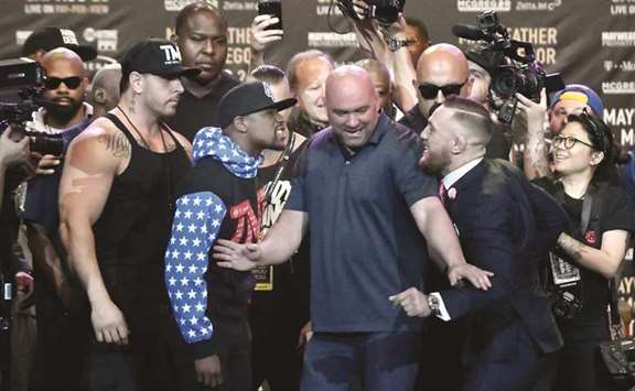 Floyd Mayweather and Conor McGregor will be allowed to wear lighter gloves when they clash in their Las Vegas superfight this month. (AFP)