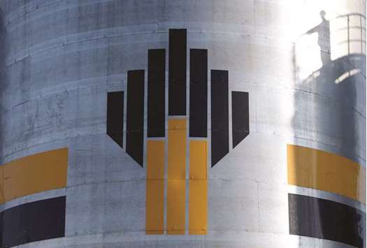 The shadow of a worker is seen next to a logo of Rosneft oil company at the central processing facility of the Rosneft-owned Priobskoye oil field outside the West Siberian city of Nefteyugansk, Russia. Russia has overtaken Saudi Arabia as Chinau2019s biggest oil supplier, and Rosneft is by far Russiau2019s biggest and most influential oil company, with strong ties to the Kremlin.