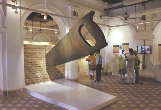 Visitors look at the installations of the newly inaugurated Partition Museum in Amritsar.