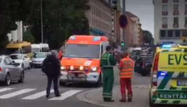 A video grab taken from Twitter shows officials standing in a street in the Finnish city of Turku where several people were stabbed.