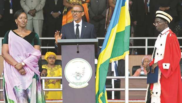 Kagame addresses the country after taking the oath of office. With him are his wife Jeannette and Rwandau2019s Chief Justice Sam Rugege.