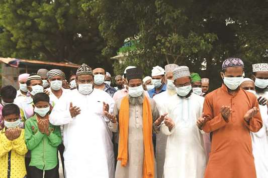 Imams participate in a special prayer to spread awareness to counter swine flu at the Shah-e-Alam Roza in Ahmedabad in Gujarat yesterday.