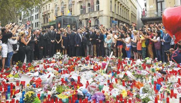 King Felipe VI and Queen Letizia pay tribute to the victims of the Barcelona attack on Las Ramblas boulevard.