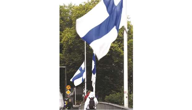 Finnish flags fly at half-mast in Turku yesterday.