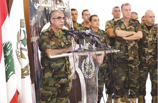 Lebanese army spokesman Ali Kanso addresses a news conference at the Ministry of Defense in Yarze, east of Beirut, yesterday.