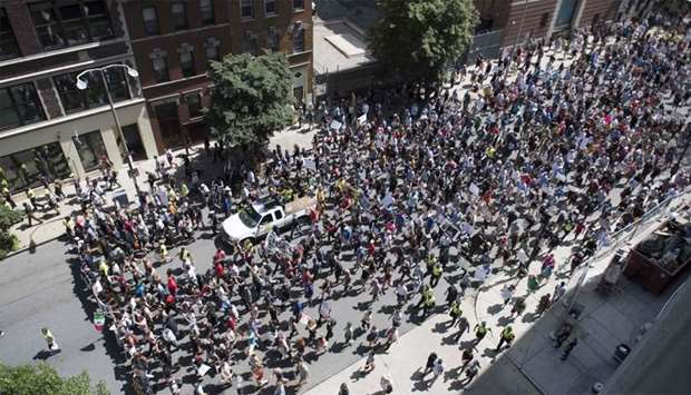 Counter-Protesters of the Boston 'Free Speech' Rally march towards Boston Commons