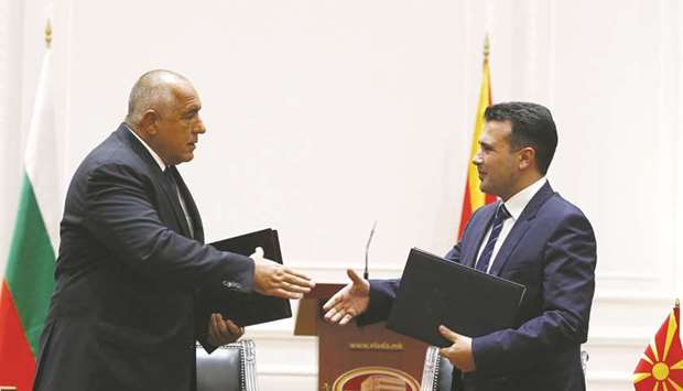 Borisov (left) and Zaev at the official signing ceremony in Skopje.