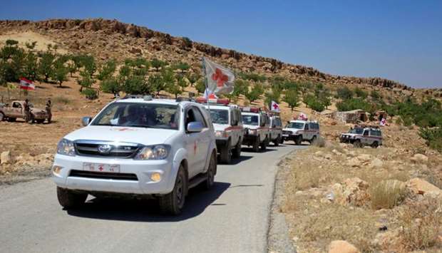 A Lebanese Red Cross convoy is seen in Jroud Arsal, near Syria-Lebanon border on August 14, 2017.