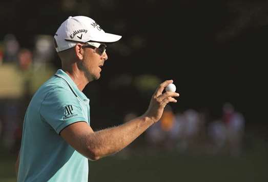 Henrik Stenson of Sweden reacts after a putt on the 17th hole during the third round of the Wyndham Championship at Sedgefield Country Club in Greensboro, North Carolina.